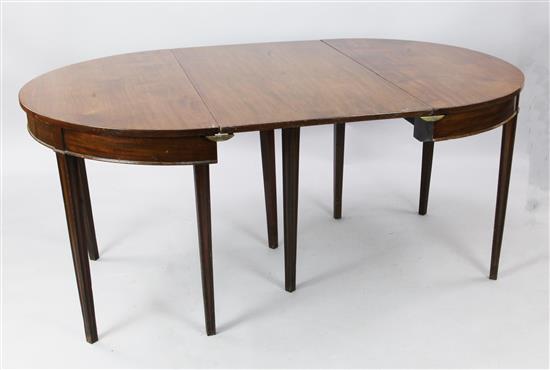A George III mahogany D-end dining table with two leaves, L. 7ft 2.25in. W. 3ft 8in. H. 2ft 6.25in.